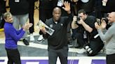 ... Kings head coach Mike Brown receives the Coach of the Year award during Game 5 of the first-round NBA playoff series against the Golden State Warriors at...