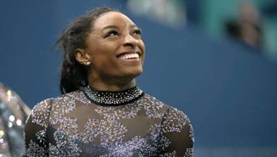 Biles and Team USA mix glamour and grit to surge to the lead at Olympic gymnastics qualifying