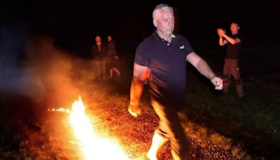 Southampton business guru gets people to walk on hot coals in new workshop