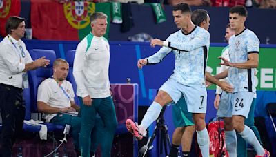 Cristiano Ronaldo kicks the turf in anger as he is substituted early