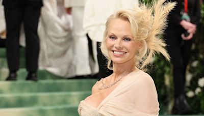 The Reason Why Pamela Anderson Wore A Full Face Of Make-Up For Her First Met Gala Appearance