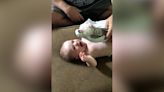 Watch this: Baby reacts with joy when he's given a doll resembling his deployed dad