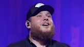 Emotional Luke Combs reveals he missed son Beau's birth while on tour