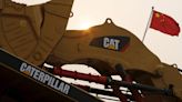 Caterpillar shares slump on sales warning as machinery demand cools