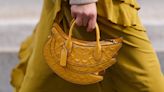 US watchdog sues to block $8.5bn handbag takeover