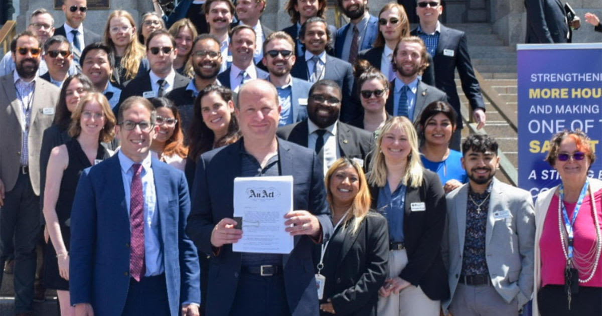 Gov. Jared Polis signs Colorado budget with focus on schools, public safety, housing