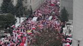 Poland's president plans to pardon 2 politicians as tens of thousands hold anti-government protest