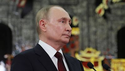 Putin says Russia will develop its nuclear arsenal to preserve global balance of power