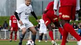 Macron takes part in charity soccer game, showing off sporting prowess