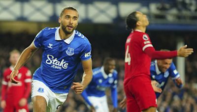 Liverpool's Premier League title hopes hit by 2-0 loss to Everton. Man United survives another scare