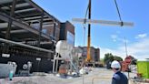 Ceremonial beam placed atop Rome Health construction