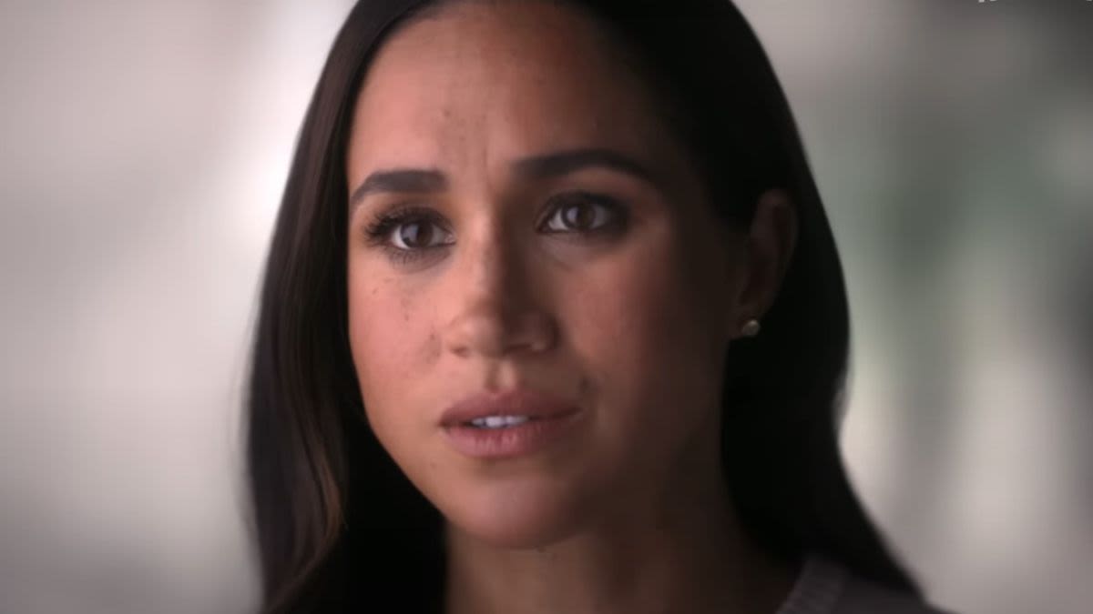 A Royal Author Claims Meghan Markle Feels ‘Under Siege’ And Her Netflix Contract Is Involved