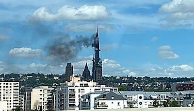 Smoke billows from Rouen Cathedral after spire catches fire