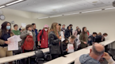 Chanting Harvard students walk out of lecture by professor accused of groping and harassment