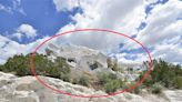 A Santa Fe jeweler covered her 1-bedroom house in foam so it would blend right in with the limestone cliffs it sits on. It's on the market for $899,000.