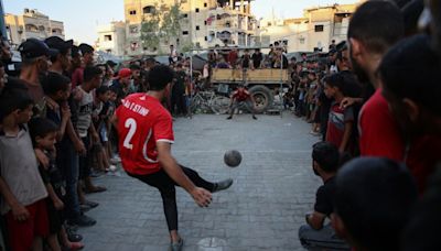 ‘We love life’: Gaza’s war-weary footballers play on