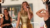 Perrie Edwards shimmers in gold jumpsuit as she performs new song