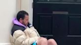 Adam Sandler spotted 'chilling' on a doorstep in London