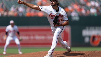 Zach Eflin yields 10 hits in Orioles debut but earns the victory in 11-5 rout of Blue Jays