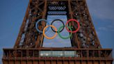 Central Paris locks down for Olympics as athletes arrive