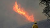 Brush fire closes I-5 as extreme heat wave grips California