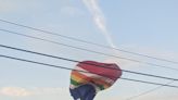 A hot air balloon crashed into a train in Burlington; three people were injured