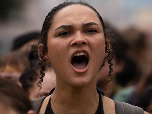 UT-Austin professors join students in walkout amid pro-Palestinian protests. See photos