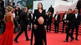 Model Adriana Lima displays baby bump in unique cut-out dress