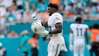 Tyreek Hill in spotlight on and off field as Miami fight back to beat Jaguars