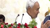 Nitish Kumar asks private company official to expedite road project, offers to touch his feet - The Economic Times