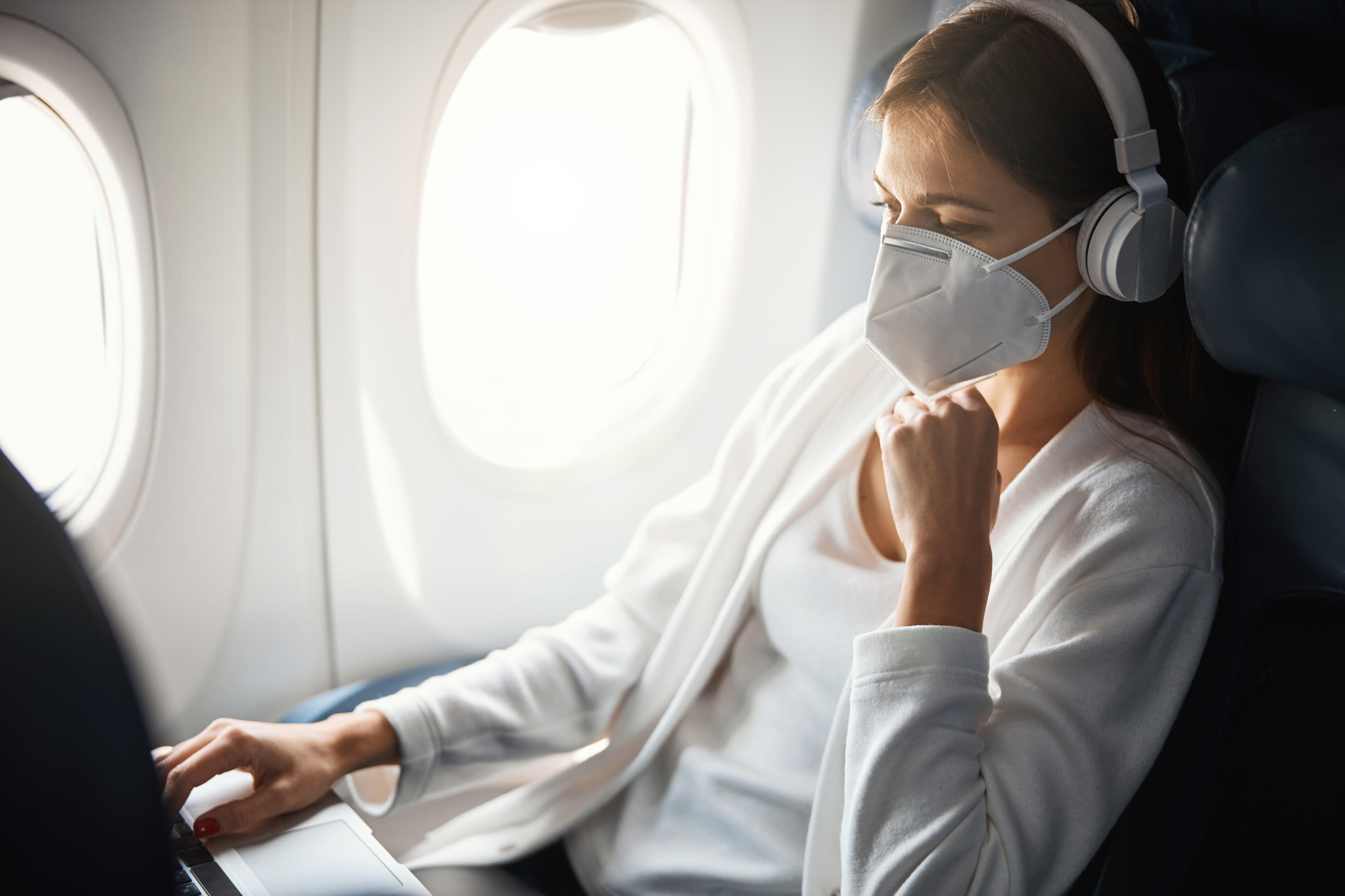 Woman wearing face mask on flight for kindest reason: "Don't judge"