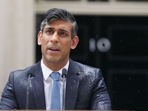 Rishi Sunak drowned out by protesters playing 'Things Can Only Get Better' as he announces snap election