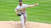 Cincinnati Reds acquire lefty reliever Sam Moll in a trade with the Oakland Athletics