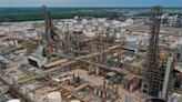 Oil giants Exxon, Chevron lean on big-ticket deals to build bigger reserves