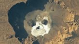 Astronaut captures image of a glowering 'skull' lurking in a giant volcanic pit in the Sahara