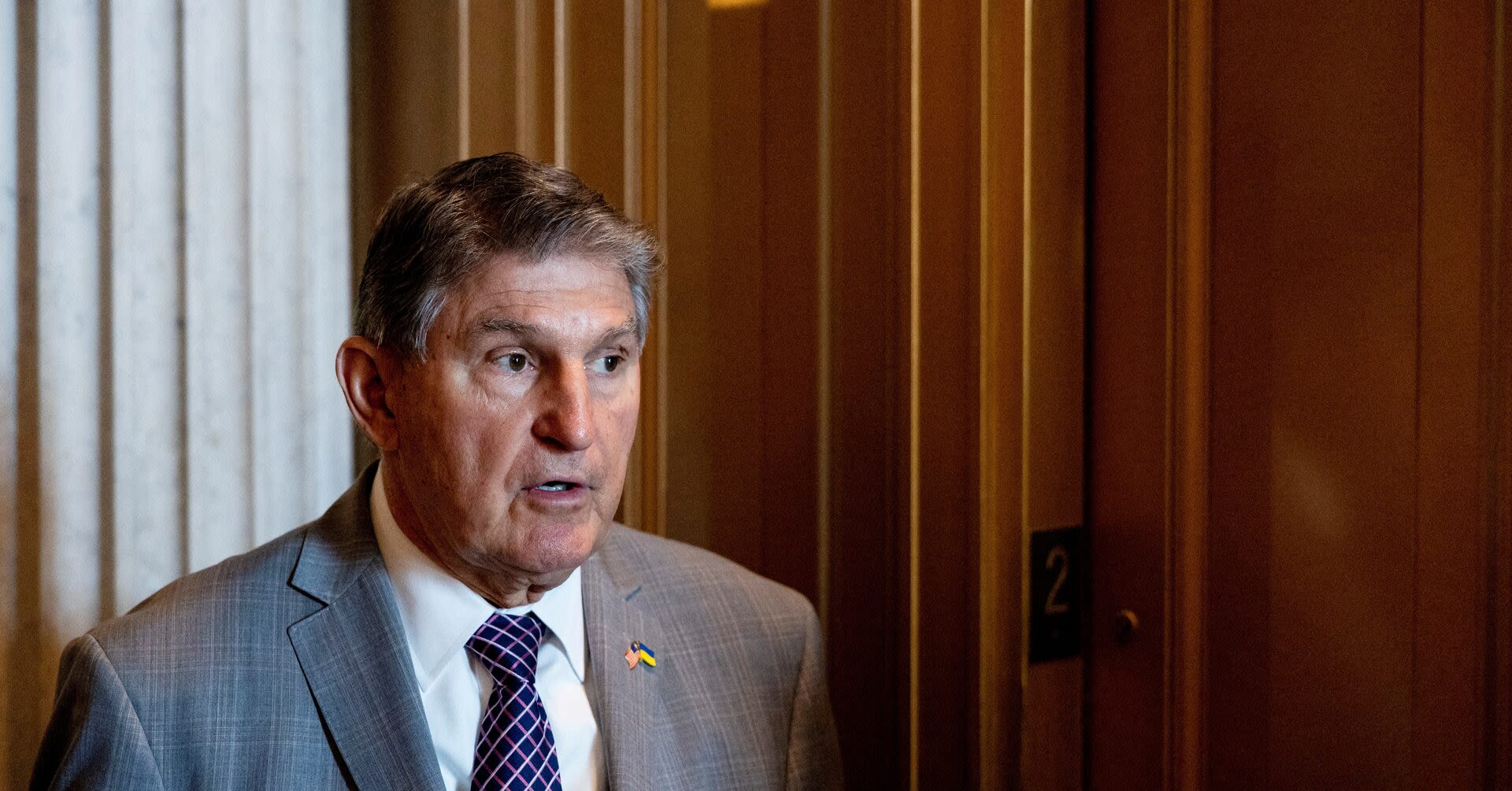 US Sen. Manchin says he's encouraging industry to sue Treasury over EV tax credits