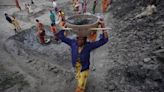 Digging rainwater pit, NREGA workers stumble upon coins dating back to 1826, gold ornaments