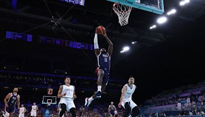 LeBron James and Kevin Durant power Team USA past Serbia, 110-84, in opening Olympic contest