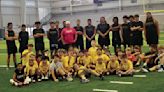 Next generation: Thunderbirds teach football summer camp