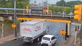 Box Truck's Lid Gets Perfectly Peeled in Oddly Satisfying 11-Foot-8 Bridge Video