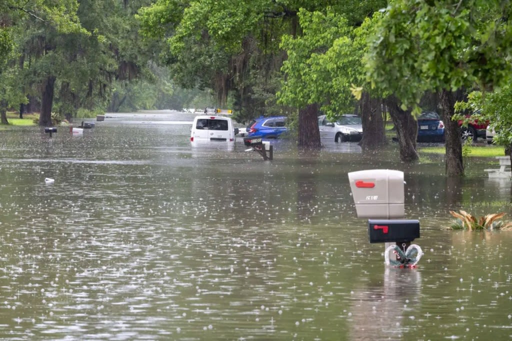 Texas rivers rise to levels not seen since Hurricane Harvey with dozens still waiting to be rescued and more heavy rains expected