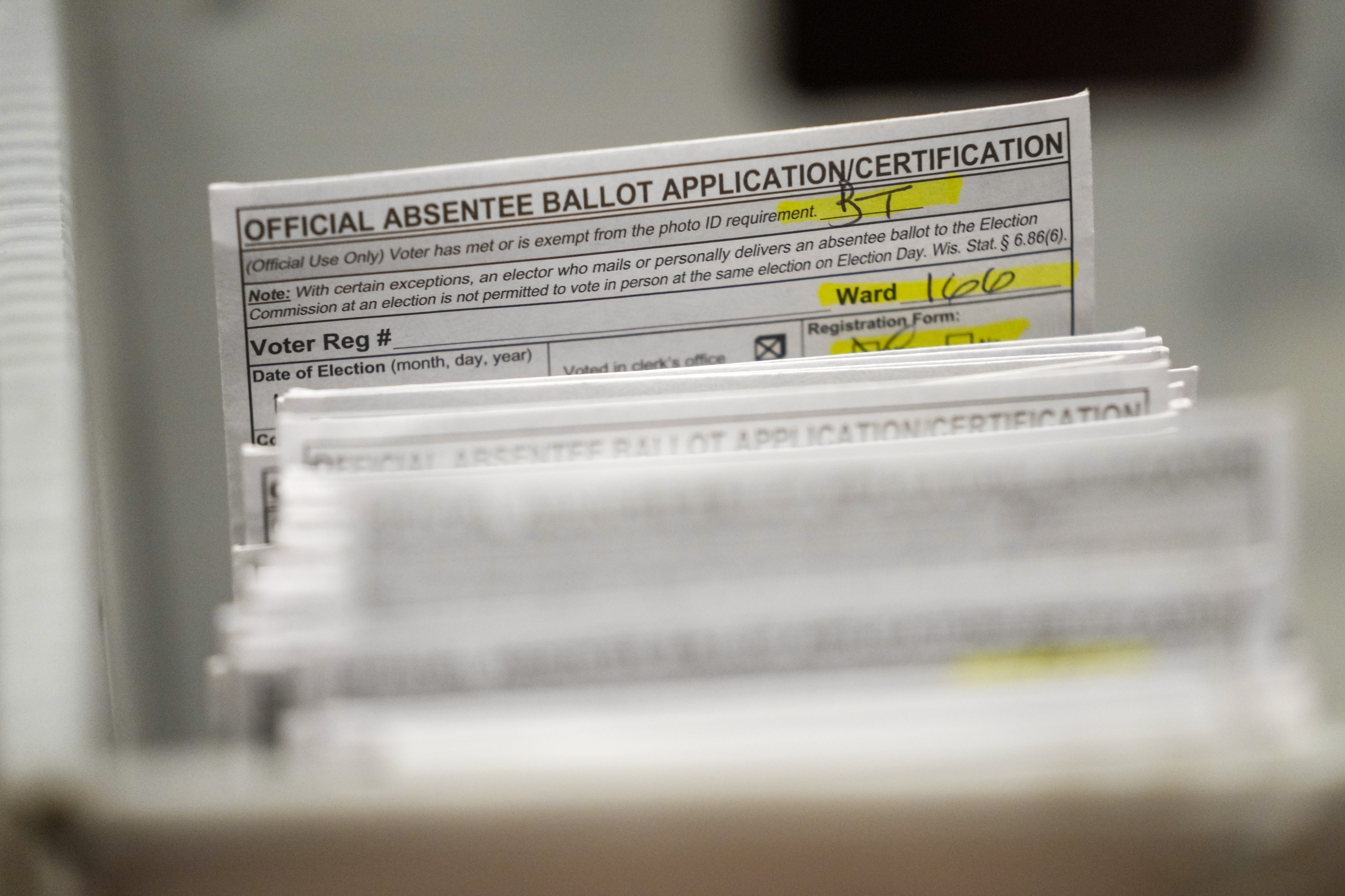 Federal judge tosses Democrats' lawsuit challenging Wisconsin absentee voting requirements