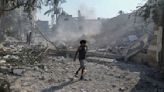 Israeli air strikes destroy a school in Gaza, killing 30 people