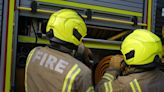 Around 100 firefighters tackling double house blaze in east London