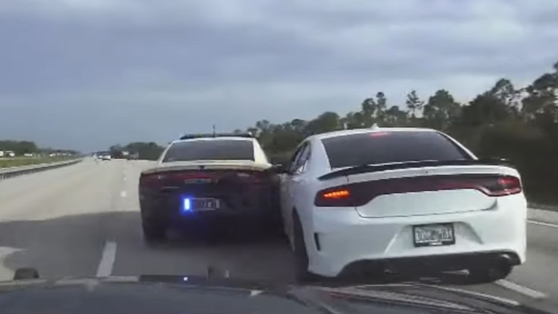 Florida Trooper Pitted By Suspect In A Dodge Charger