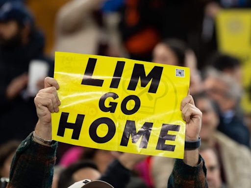 Valencia fans on honeymoon in Singapore held by police over Peter Lim protest