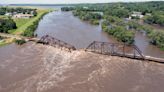 More rain possible in deluged Midwest as flooding kills 2, causes water to surge around dam