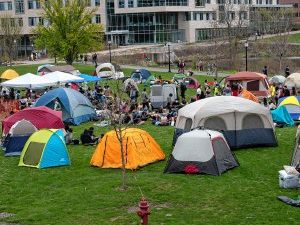 Pro-Palestinian protesters set up encampment at UMass flagship, joining growing national movement