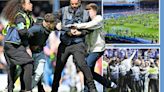 Birmingham fans clash with stewards as they invade pitch after relegation