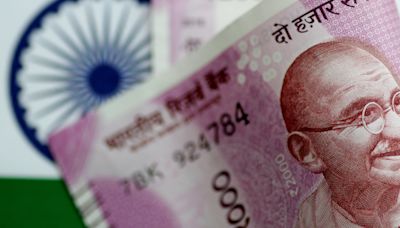 Rupee closes mildly weaker, forward premiums slip